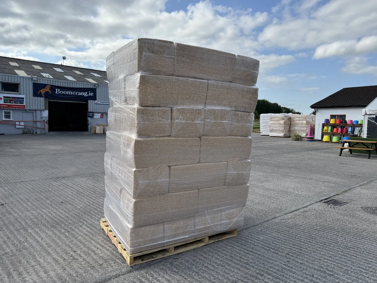 Pallet of baled shavings bedding at Boomerang.ie, Thurles — supplied on pallets across Ireland